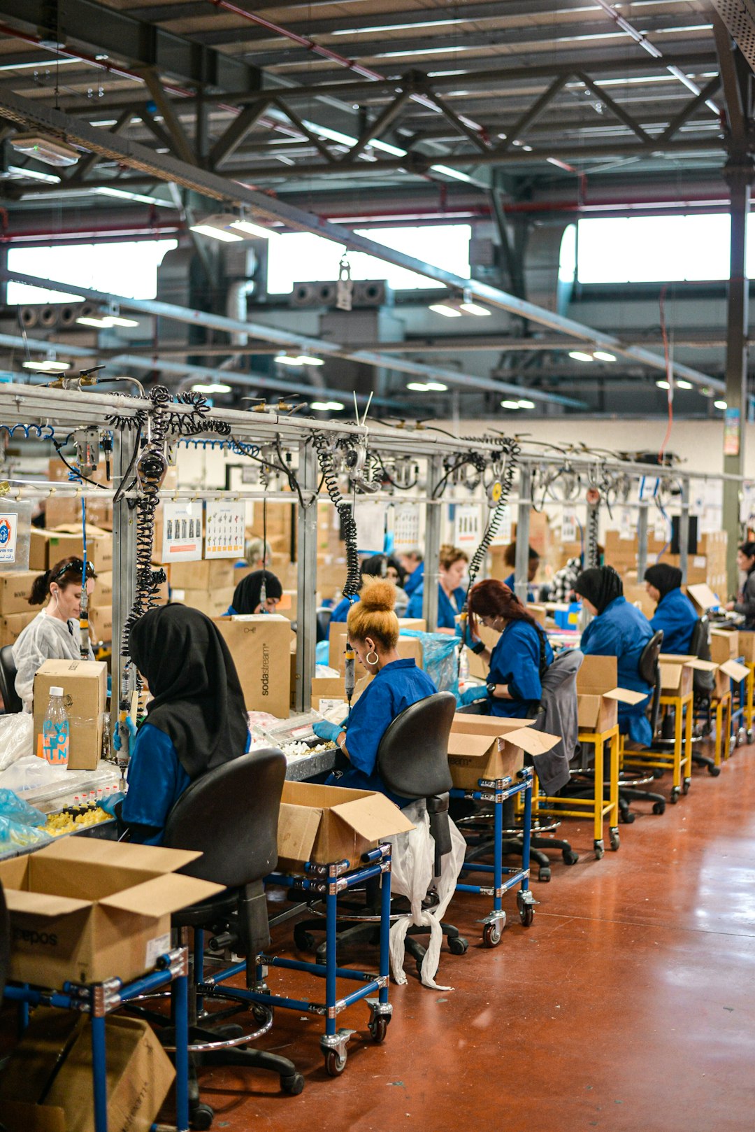 Women working on SodaSteam devices at the SodaStream factory in Israel. Shot during press trip to SodaStream factory in 2019.